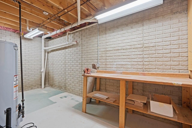 5330 Deer Trail Ln, Sheboygan, WI 53083 - unfinished below grade area with water heater and brick wall