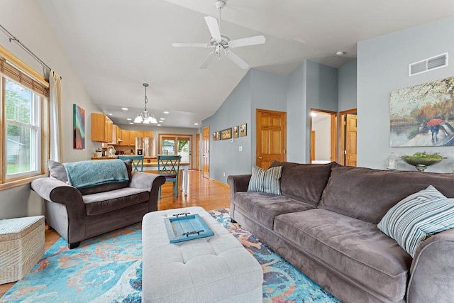 1630 Central St, Oshkosh, WI 54901 - living area featuring a chandelier, plenty of natural light, recessed lighting, light wood-type flooring, and a ceiling fan
