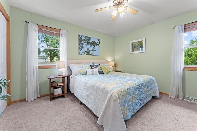 1630 Central St, Oshkosh, WI 54901 - carpeted bedroom featuring baseboards and ceiling fan