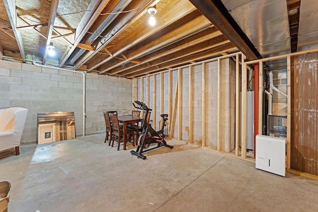 1630 Central St, Oshkosh, WI 54901 - unfinished basement featuring water heater and concrete block wall