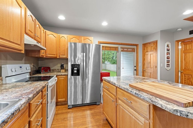 1630 Central St, Oshkosh, WI 54901 - kitchen with stainless steel refrigerator with ice dispenser, under cabinet range hood, white electric range oven, light wood-type flooring, and recessed lighting