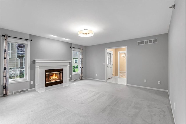 2855 River Birch Dr Unit D, Brookfield, WI 53045 - unfurnished living room with carpet flooring and a premium fireplace