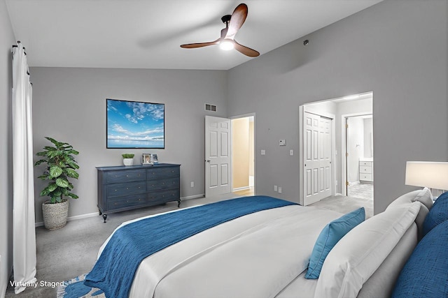 2855 River Birch Dr Unit D, Brookfield, WI 53045 - bedroom featuring high vaulted ceiling, connected bathroom, light colored carpet, and ceiling fan