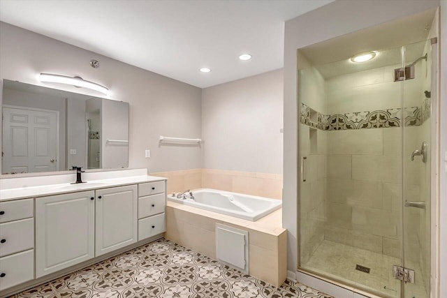 2855 River Birch Dr Unit D, Brookfield, WI 53045 - full bath with a garden tub, a stall shower, vanity, tile patterned flooring, and recessed lighting