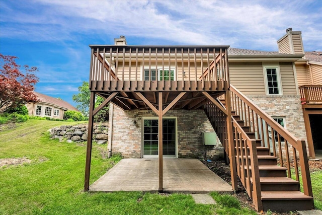 2855 River Birch Dr Unit D, Brookfield, WI 53045 - rear view of house with a patio area, a chimney, a yard, and a wooden deck