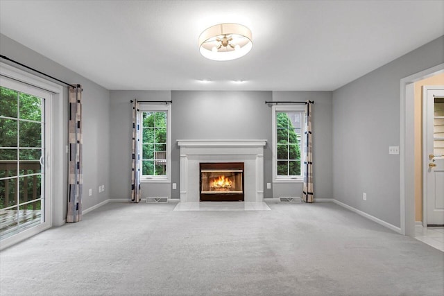 2855 River Birch Dr Unit D, Brookfield, WI 53045 - unfurnished living room with carpet and a fireplace with flush hearth