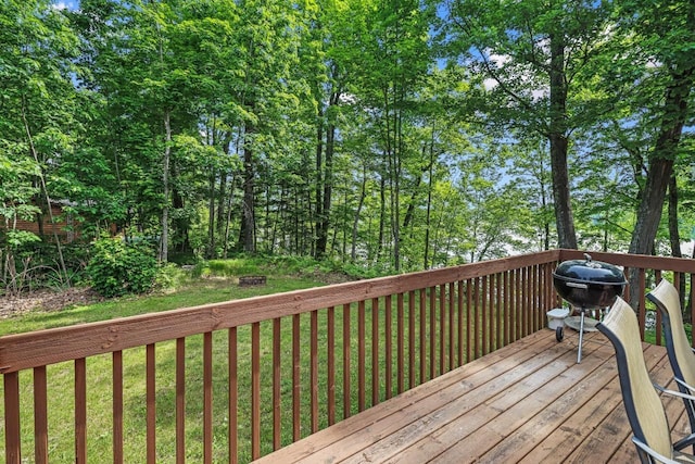 1780 Amik Lake Ln, Lac Du Flambeau, WI 54538 - wooden deck featuring a lawn and grilling area