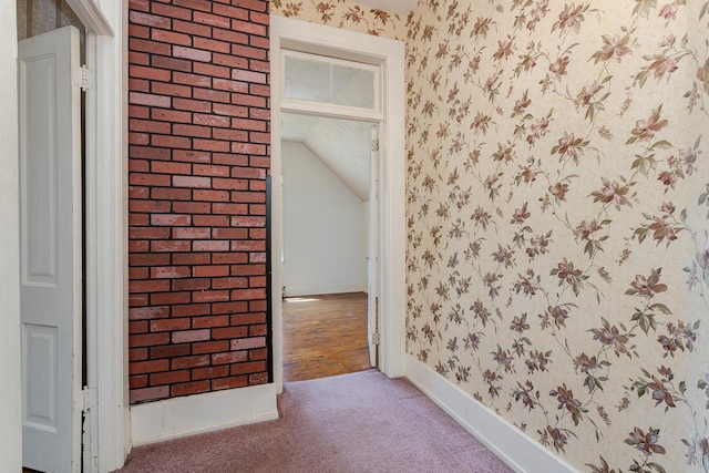 305 N Center Ave, Merrill, WI 54452 - spare room featuring wallpapered walls, carpet flooring, and lofted ceiling