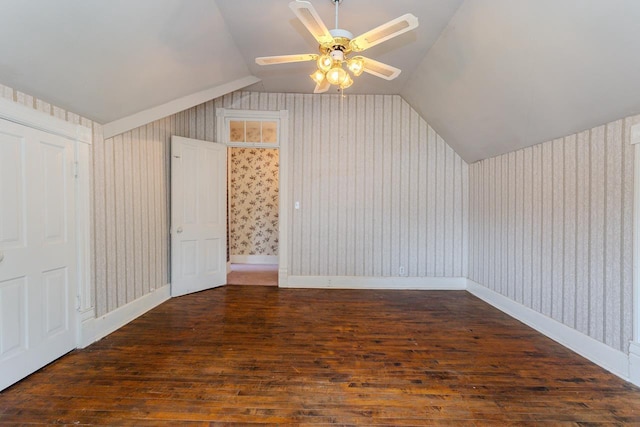 305 N Center Ave, Merrill, WI 54452 - bonus room with wallpapered walls, wood finished floors, vaulted ceiling, and a ceiling fan