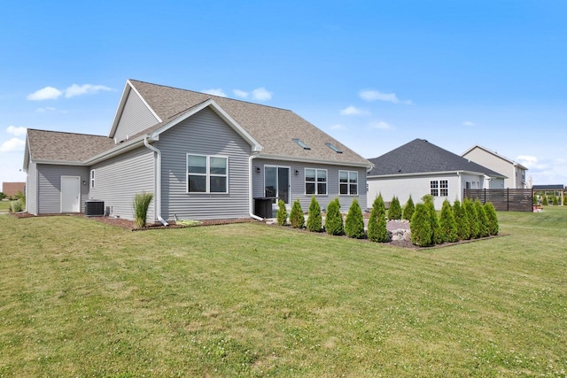1451 Whalen Dr, Oconomowoc, WI 53066 - rear view of property with a shingled roof