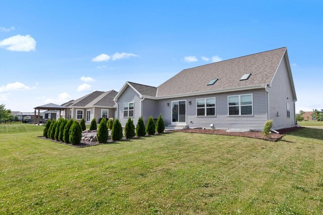 1451 Whalen Dr, Oconomowoc, WI 53066 - rear view of house featuring a gazebo, a lawn, entry steps, and roof with shingles