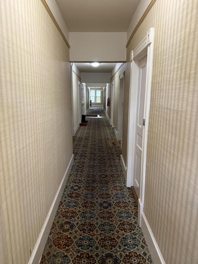 525 Dunbar Ave, Waukesha, WI 53186 - hall with baseboards and dark carpet