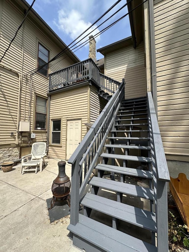 525 Dunbar Ave, Waukesha, WI 53186 - patio / terrace featuring stairway, a patio area, and a fire pit