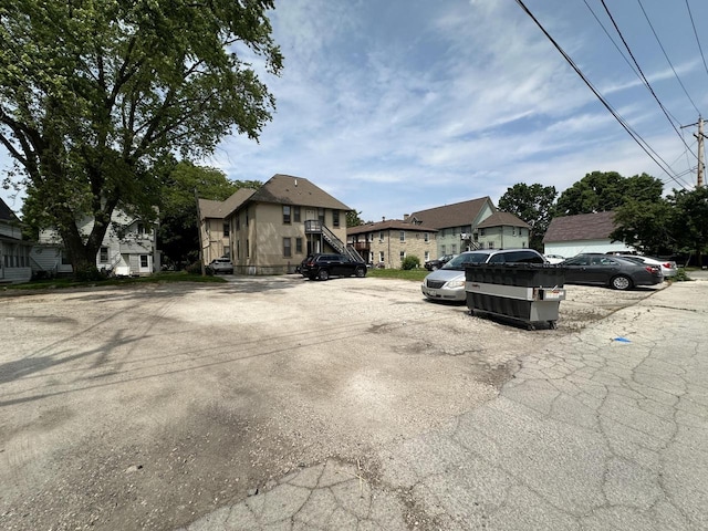 525 Dunbar Ave, Waukesha, WI 53186 - view of front of property with uncovered parking and a residential view