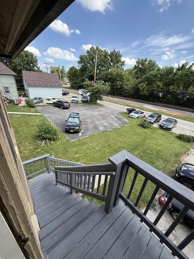 525 Dunbar Ave, Waukesha, WI 53186 - wooden porch featuring a yard