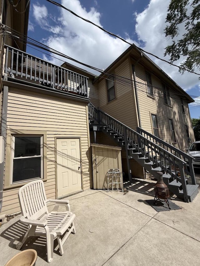 525 Dunbar Ave, Waukesha, WI 53186 - view of home's exterior with stairs and a patio