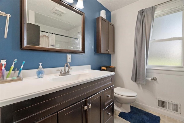 3021 Dwight St, Racine, WI 53403 - bathroom featuring vanity, a shower with curtain, and tile patterned flooring