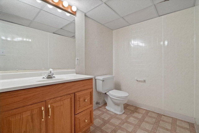 3021 Dwight St, Racine, WI 53403 - bathroom with a paneled ceiling, tile patterned floors, and vanity