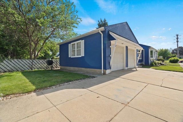 3021 Dwight St, Racine, WI 53403 - view of home's exterior featuring a garage and driveway