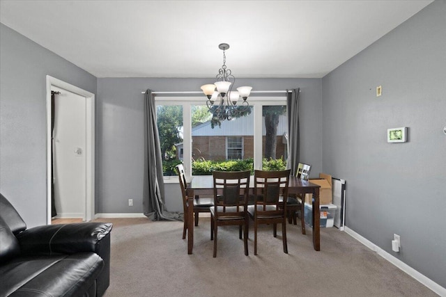 3021 Dwight St, Racine, WI 53403 - dining room with a chandelier and light colored carpet