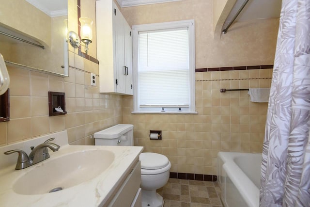 3940 N 64th St, Milwaukee, WI 53216 - full bath with tile walls, vanity, ornamental molding, and shower / bath combo