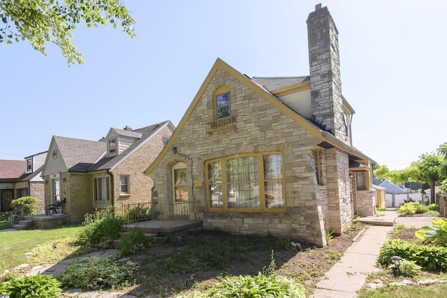 3940 N 64th St, Milwaukee, WI 53216 - english style home with stone siding and a chimney