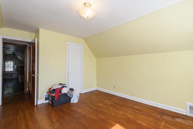 3940 N 64th St, Milwaukee, WI 53216 - additional living space featuring wood finished floors and vaulted ceiling