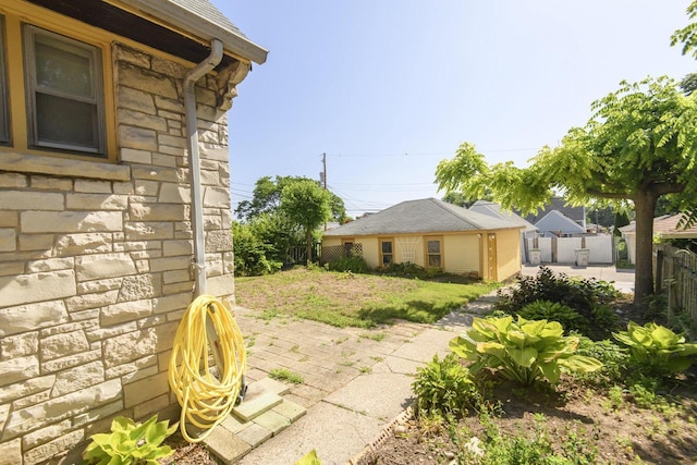 3940 N 64th St, Milwaukee, WI 53216 - view of yard with a patio area and an outdoor structure