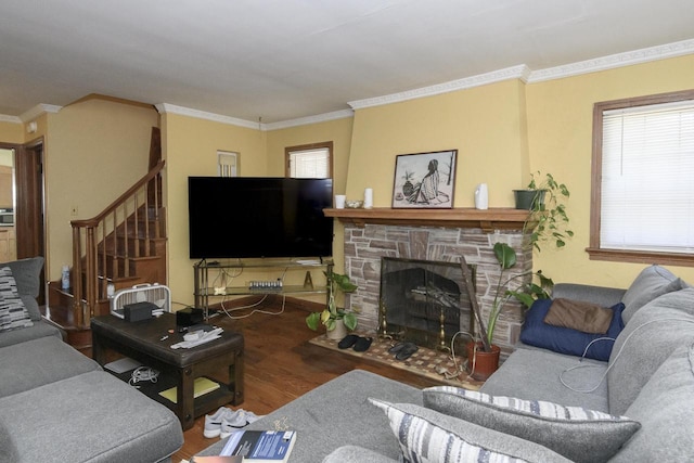 3940 N 64th St, Milwaukee, WI 53216 - living room with wood finished floors, stairway, crown molding, and a fireplace