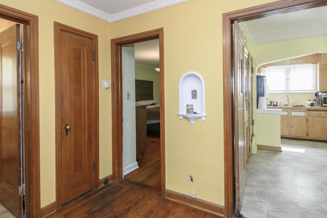 3940 N 64th St, Milwaukee, WI 53216 - hallway featuring crown molding and light wood-type flooring