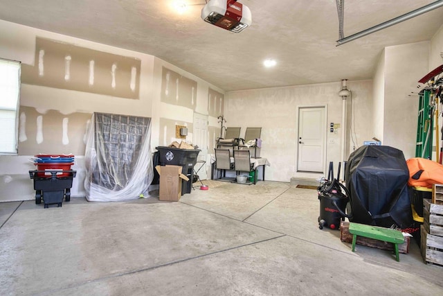 W195N5814 Deer Park Ct, Menomonee Falls, WI 53051 - garage featuring a garage door opener