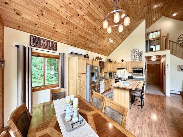 N6448 Neva Lake Rd, Deerbrook, WI 54424 - dining space with a wall mounted air conditioner, a chandelier, baseboard heating, wooden ceiling, and light wood-style floors