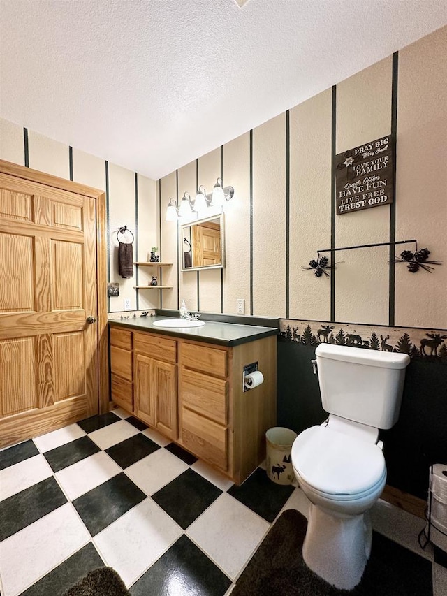 N6448 Neva Lake Rd, Deerbrook, WI 54424 - bathroom featuring vanity, tile patterned floors, and a textured ceiling
