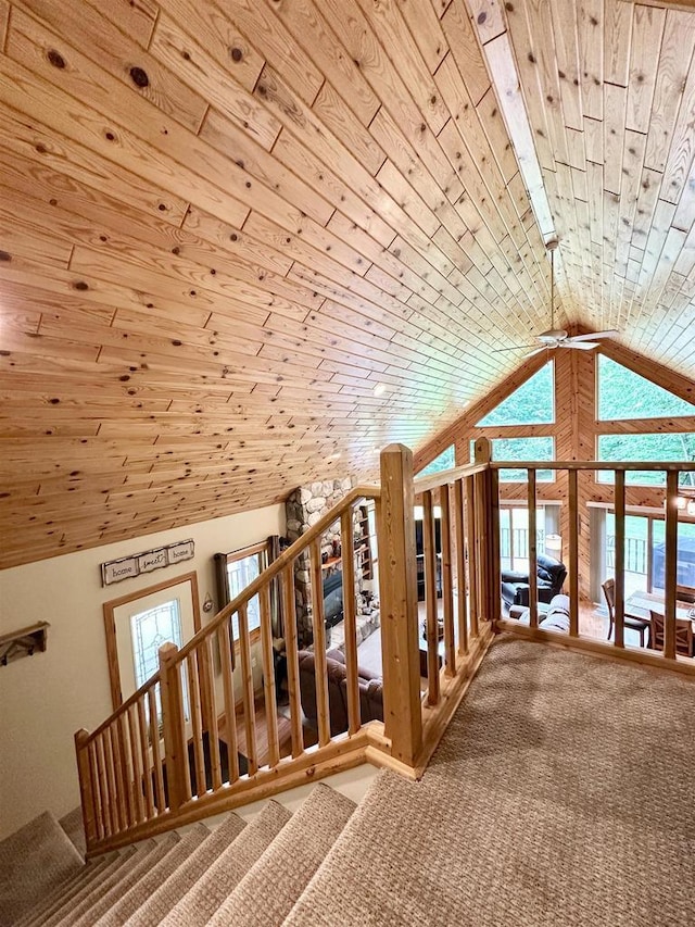 N6448 Neva Lake Rd, Deerbrook, WI 54424 - staircase featuring wood ceiling, carpet floors, healthy amount of natural light, vaulted ceiling, and a ceiling fan