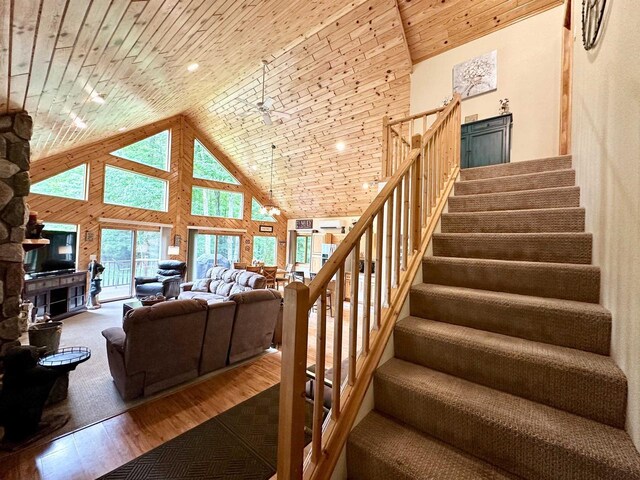 N6448 Neva Lake Rd, Deerbrook, WI 54424 - staircase with high vaulted ceiling, hardwood / wood-style floors, and wooden ceiling