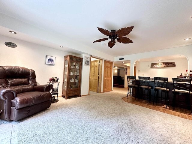 N6448 Neva Lake Rd, Deerbrook, WI 54424 - living room with arched walkways, ceiling fan, carpet flooring, and recessed lighting