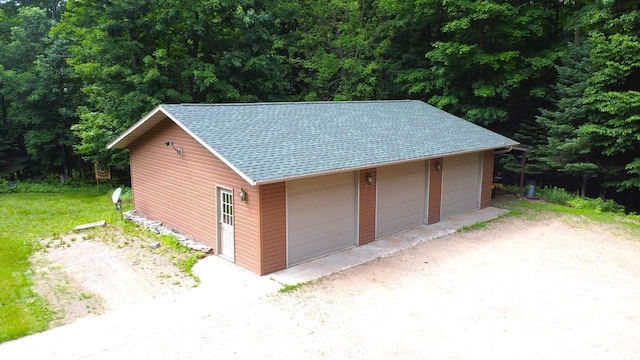N6448 Neva Lake Rd, Deerbrook, WI 54424 - detached garage with a forest view