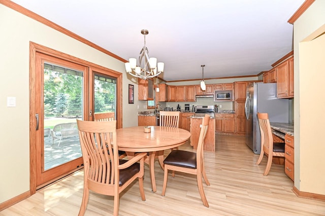 2191 W Hope Ln, Oak Creek, WI 53154 - dining space with a chandelier, crown molding, and light wood-style flooring