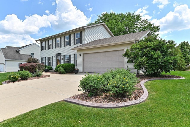 2191 W Hope Ln, Oak Creek, WI 53154 - colonial-style house with concrete driveway, a garage, and a front lawn