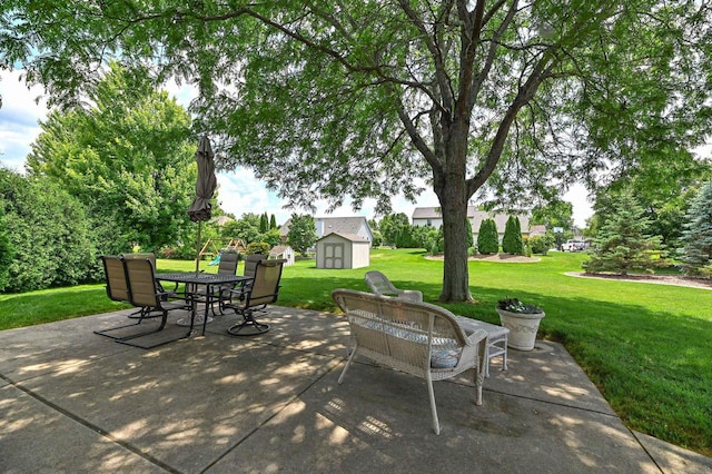 2191 W Hope Ln, Oak Creek, WI 53154 - view of patio with a storage shed and outdoor dining area