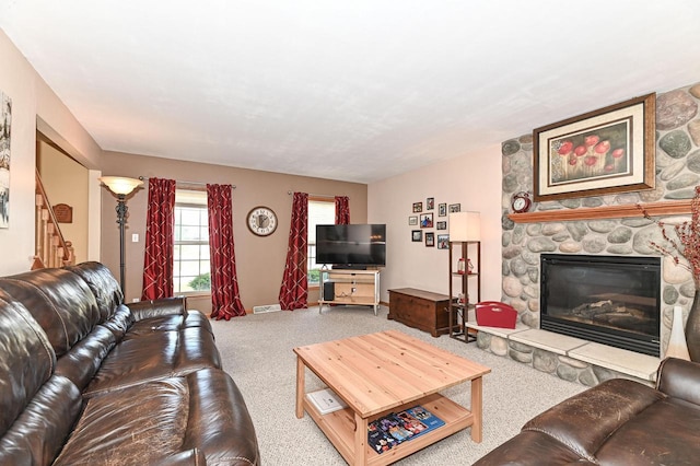 2191 W Hope Ln, Oak Creek, WI 53154 - living area featuring carpet flooring, a fireplace, and stairs