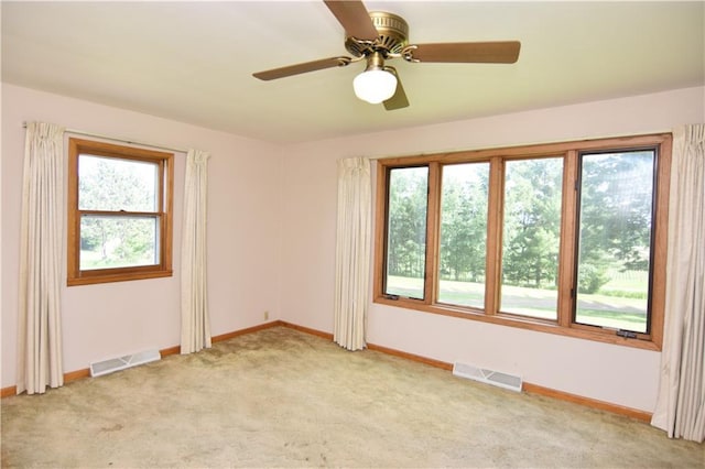 15754 County Highway M, New Auburn, WI 54757 - spare room with healthy amount of natural light, light colored carpet, and a ceiling fan