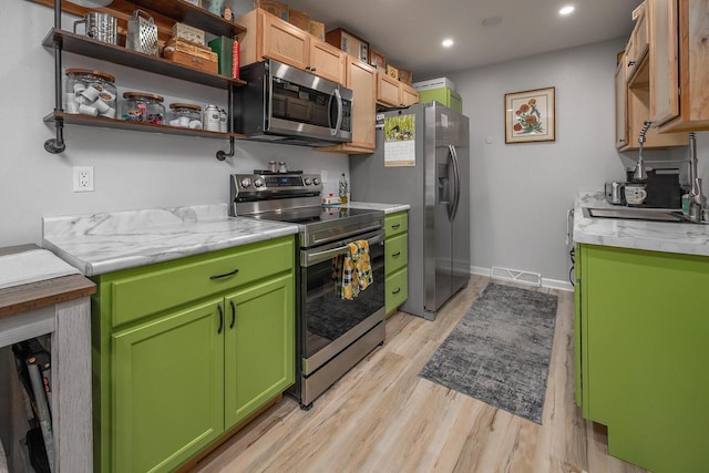 1363 Josephine St Unit E, Waukesha, WI 53186 - kitchen featuring appliances with stainless steel finishes, recessed lighting, light countertops, light wood-type flooring, and open shelves