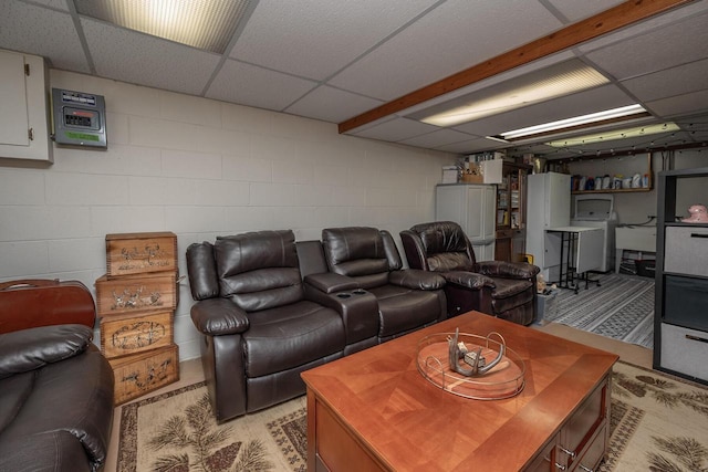 1363 Josephine St Unit E, Waukesha, WI 53186 - home theater room with concrete block wall, a drop ceiling, and washer / dryer