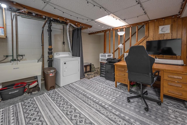 1363 Josephine St Unit E, Waukesha, WI 53186 - home office featuring washer / clothes dryer, concrete block wall, and wood walls