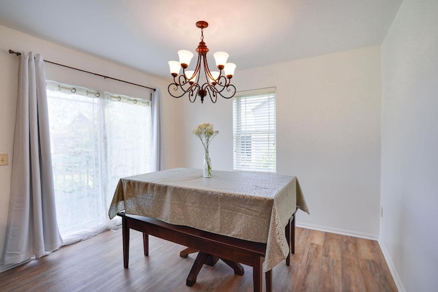 408 Juniper St, Brooklyn, WI 53521 - dining room with a chandelier and wood finished floors