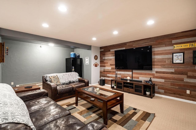 1255 Winterberry Rd, Oconomowoc, WI 53066 - carpeted living area with wooden walls, recessed lighting, an accent wall, and a baseboard radiator