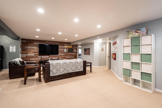 1255 Winterberry Rd, Oconomowoc, WI 53066 - living area featuring wood walls, light colored carpet, and recessed lighting