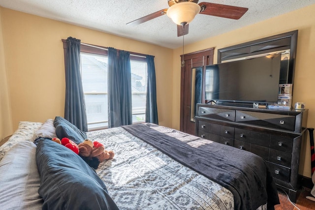 3011 16th St, Racine, WI 53405 - bedroom with a textured ceiling and ceiling fan