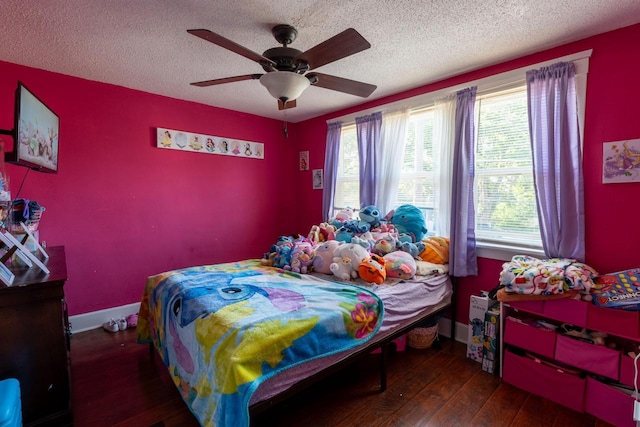 3011 16th St, Racine, WI 53405 - bedroom featuring a textured ceiling, wood-type flooring, and a ceiling fan